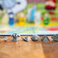 CLUE: Peanuts Board Game, Solve The Mystery of Linus's Missing Blanket with Charlie Brown, Snoopy, & Friends, Explore Iconic Locations Like Lucy’s Booth & Charlie’s House, Officially Licensed Game