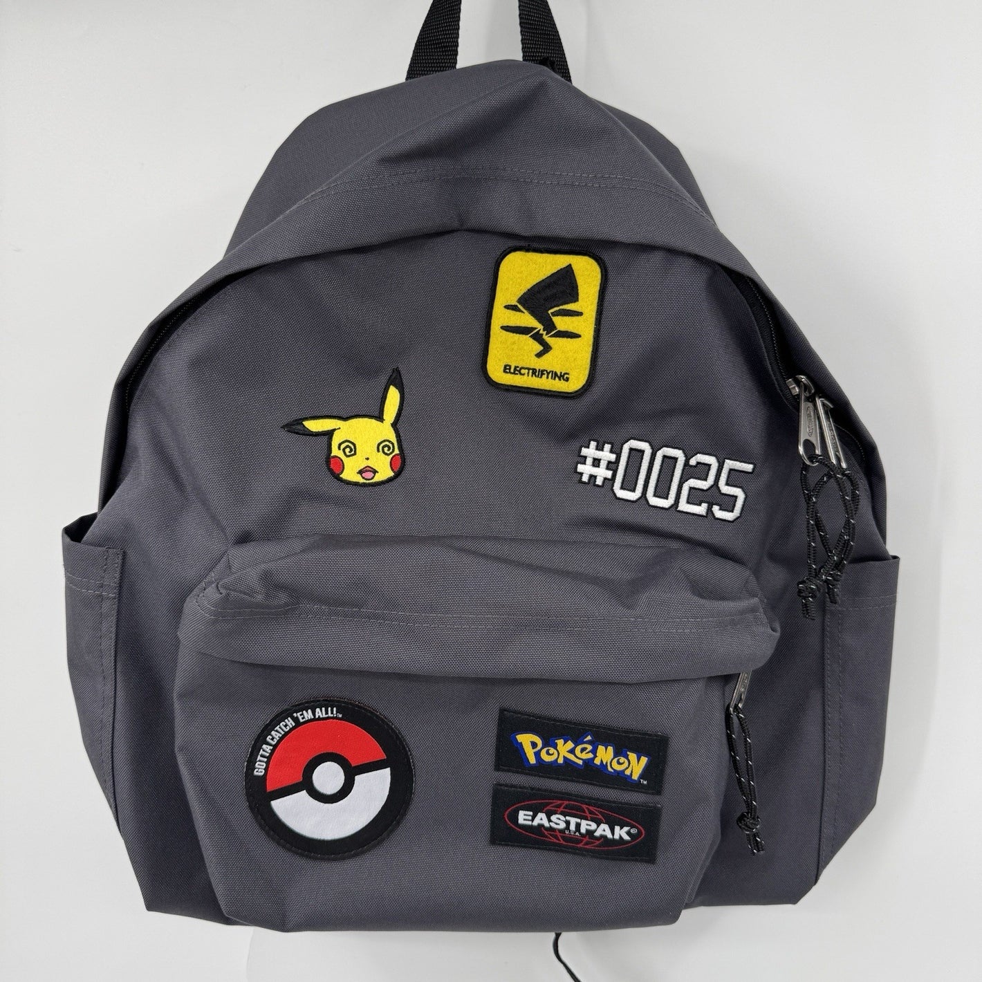 NWT Pokemon x Eastpak Day Pak'r Patches Grey 24L Backpack