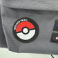 NWT Pokemon x Eastpak Day Pak'r Patches Grey 24L Backpack