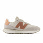 New Balance Women's 237 V1 Sneaker, White/Pink, 8