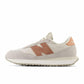 New Balance Women's 237 V1 Sneaker, White/Pink, 8