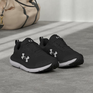 Under Armour Women's Charged Assert 10, (001) Black/Black/White, 11, US